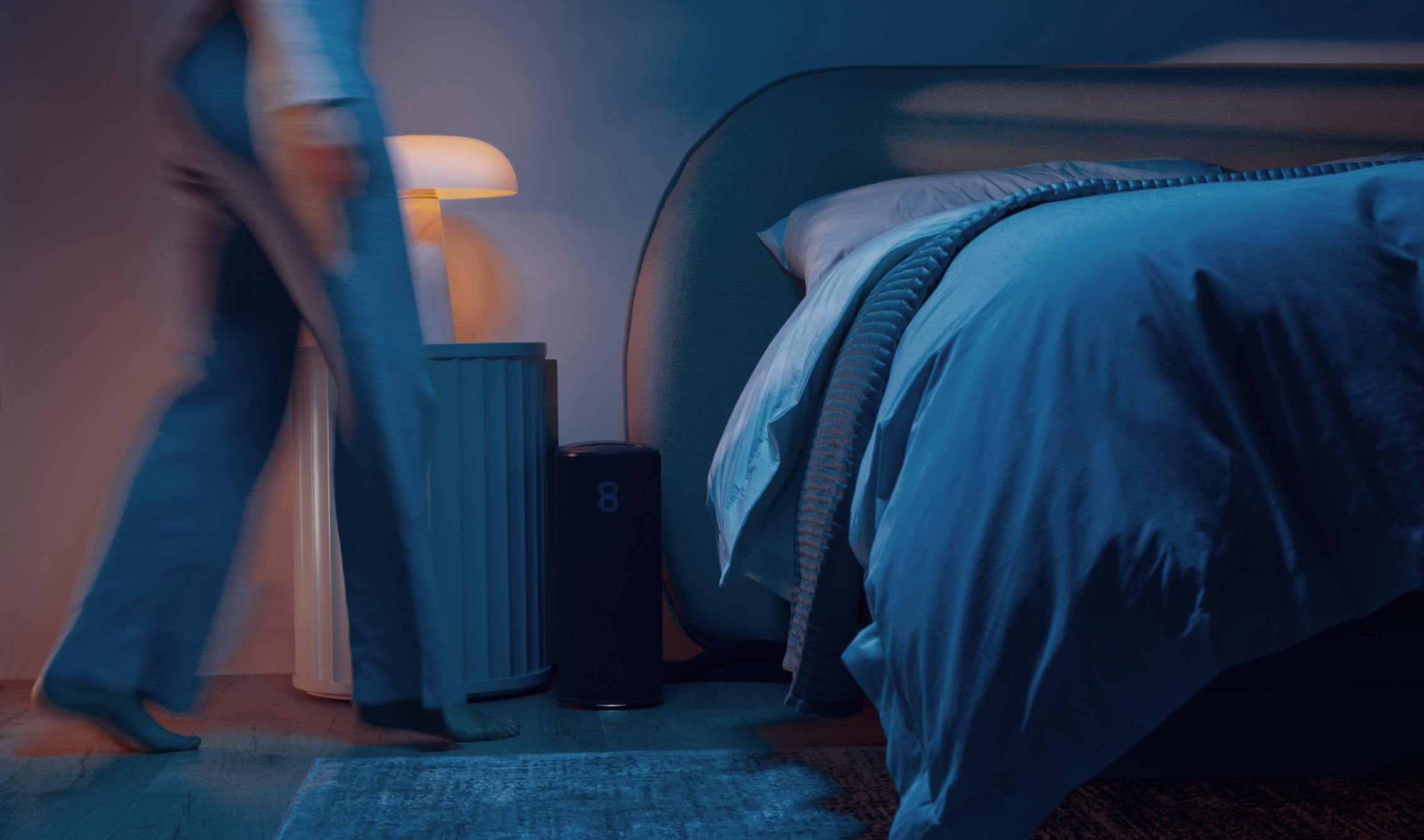 A cool bedroom with the Pod 4 by the bedside